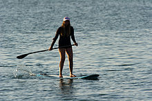 220px-Woman_stand_up_paddle_surfing