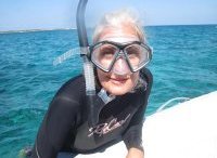 Tammy inside her snorkel mask.