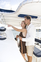 yacht sailboat cruising sail caribbean couple wheel deluxe getaway